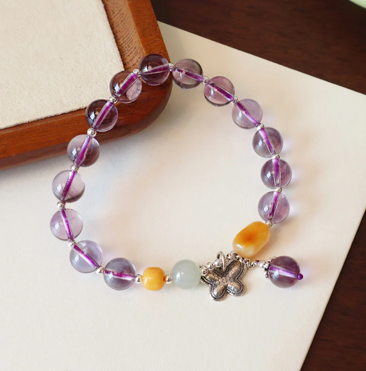 Amethyst bracelet with silver butterfly