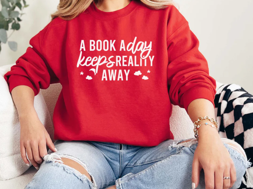 A Book A Day Keeps Reality Away Sweatshirt